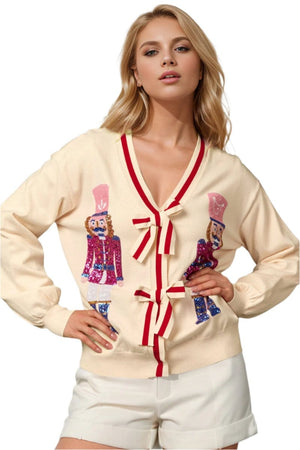 top Double Take  Nutcracker Sequin Bow Cardigan Cream / S/M Trendsi